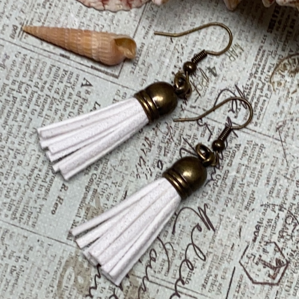 NWOT White tassel earrings antique brass finish